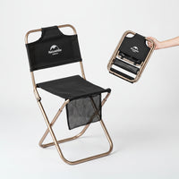 Black folding chair with gold frame and Naturehike logo, 