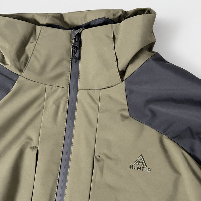 HUMTTO 48C176A-2 olive green and dreamy black outdoor shell, standing collar zipper and embroidered logo detail