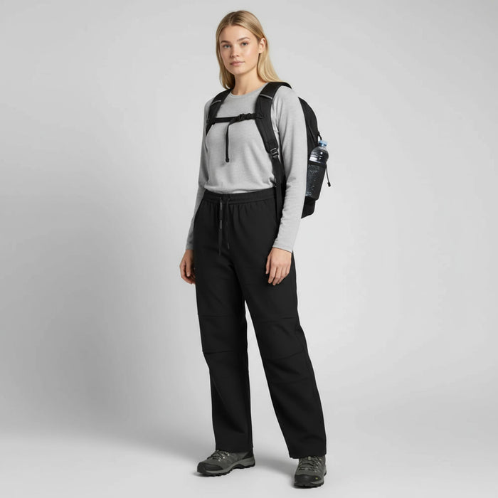 humtto softshell bikses, melnas, plašas un ērtas, piemērotas pārgājieniem un aktīvai atpūtai Latvijā