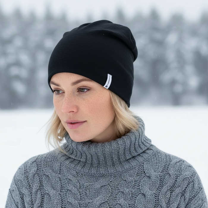 thermowave merino beanie melna adīta cepure ziemai, siltuma saglabāšanai, āra aktivitātēm latvijas klimatā