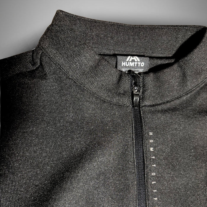 humtto sieviešu flīsa bāzes slāņa krekls ar rāvējslēdzēju, melns, silts un ērts, piemērots pārgājieniem un aktīvai atpūtai Latvijā