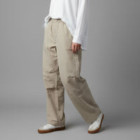 Humtto vieglas pārgājienu bikses, bežs, UPF 50 aizsardzība, vasaras pārgājieniem un ikdienai.