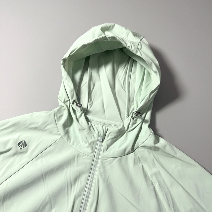 Humtto sieviešu UV aizsargjaka, viegla, cerulean zaļa, ar kapuci, piemērota pārgājieniem un riteņbraukšanai.