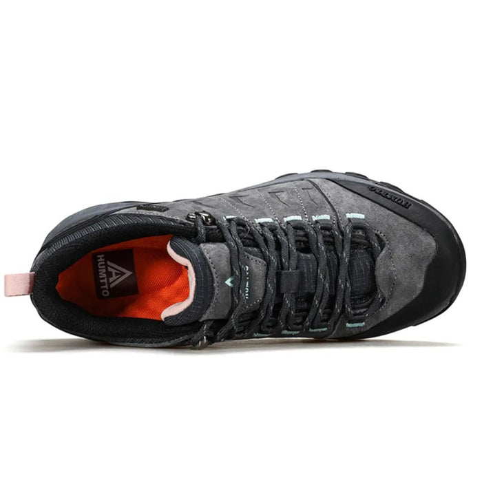 HUMTTO StoneGrip – sieviešu pelēkas pārgājienu kurpes ar ādas virsu un pirkstu aizsardzību ikdienas aktivitātēm.