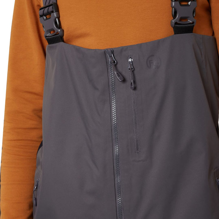 FHM ziema makšķerēšanas bikses, dermizax membrāna, ūdensnecaurlaidīgas, pelēkas, tuvplāns uz rāvējslēdzēju un jostas siksnām.