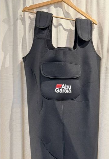 Abu Garcia neoprene fishing waders hanging