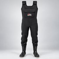 Abu Garcia neoprene fishing waders on light gray studio background