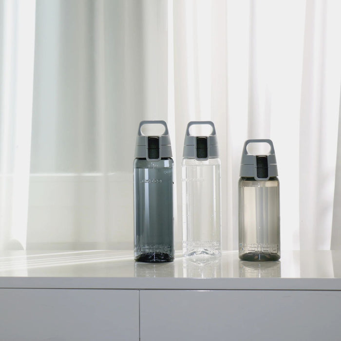 Sigg ūdens pudele no Tritan materiāla, 600 ml, caurspīdīga, sportam un ikdienas lietošanai, ērta un hermētiska.