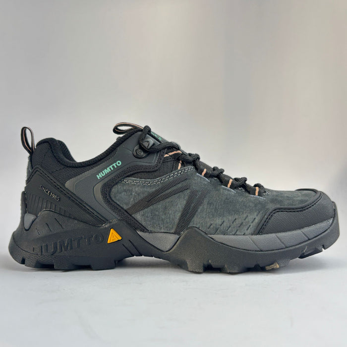Humtto pārgājienu apavi ar ādas virsmu, purngala aizsardzību, tumši zaļi, piemēroti trekingam un pārgājieniem.