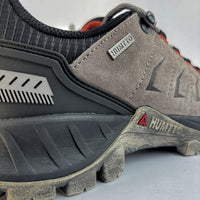 humtto pārgājienu apavi, zemi, pelēki ar gumijas zoli, izturīgi un piemēroti Latvijas laikapstākļiem, tuvplāns